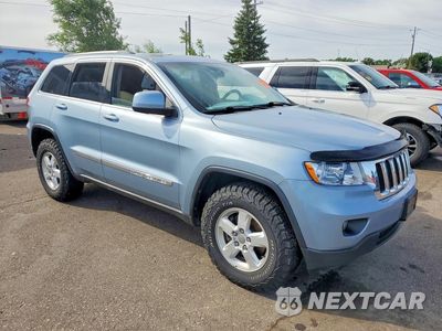 Czwarte zdjęcie samochodu z boku: 2012 JEEP GRAND CHEROKEE LAREDO VIN:1C4RJFAG2CC242679 - miniatura