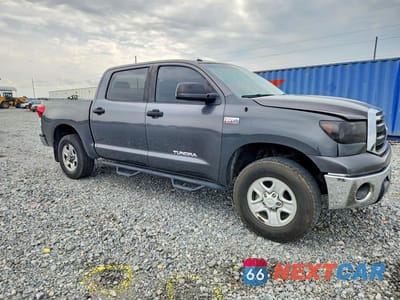 Czwarte zdjęcie samochodu z boku: 2012 TOYOTA TUNDRA CREWMAX SR5 VIN:5TFDW5F12CX261431 - miniatura