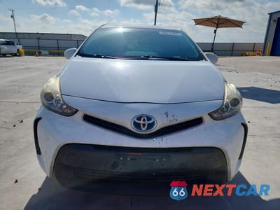 Piąte zdjęcie samochodu w środku: 2016 TOYOTA PRIUS V TWO VIN:JTDZN3EU2GJ044124 - miniatura