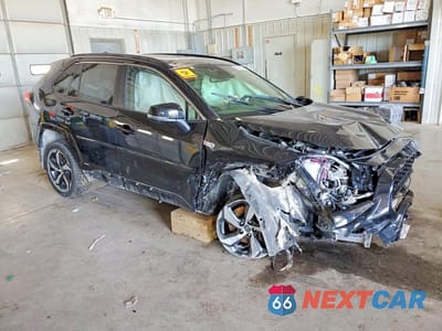 Czwarte zdjęcie samochodu z boku: 2021 TOYOTA RAV4 PRIME SE VIN:JTMAB3FVXMD063284 - miniatura