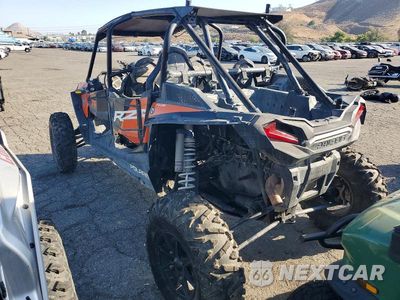 Trzecie zdjęcie samochodu z tyłu: 2021 POLARIS RZR TURBO S UTILITY VEHICLE VIN:3NSP4E927MF579949 - miniatura