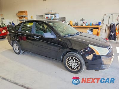 Czwarte zdjęcie samochodu z boku: 2009 FORD FOCUS SE VIN:1FAHP35N39W246805 - miniatura