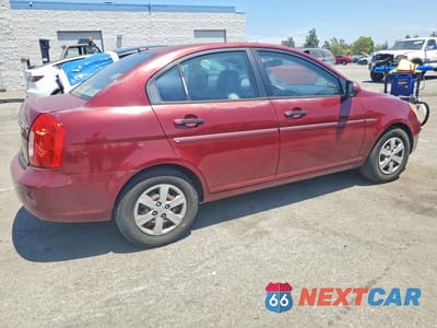 Czwarte zdjęcie samochodu z boku: 2010 HYUNDAI ACCENT GLS VIN:KMHCN4AC6AU423069 - miniatura