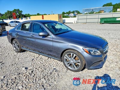 Czwarte zdjęcie samochodu z boku: 2017 MERCEDES-BENZ C 300 4MATIC VIN:55SWF4KB7HU182399 - miniatura