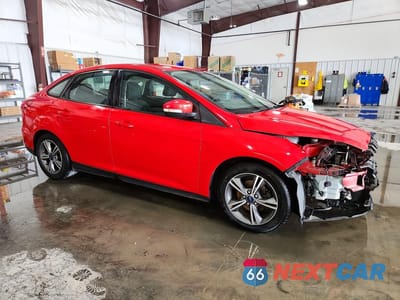 Czwarte zdjęcie samochodu z boku: 2016 FORD FOCUS SE VIN:1FADP3FE9GL361033 - miniatura
