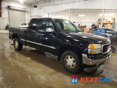 Czwarte zdjęcie samochodu z boku: 2002 GMC NEW SIERRA K1500 VIN:2GTEK19VX21130850 - miniatura