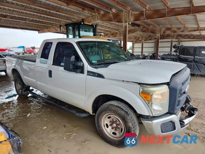 Czwarte zdjęcie samochodu z boku: 2014 FORD F250 SUPER DUTY VIN:1FT7X2A62EEB24886 - miniatura