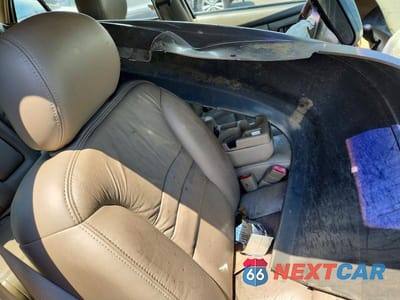 Zdjęcie 12 z 13 samochodu: 2002 BUICK CENTURY LIMITED VIN:2G4WY55J021168483 - miniatura