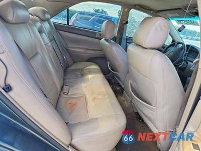 Zdjęcie 10 z 11 samochodu: 2002 TOYOTA CAMRY LE VIN:4T1BE32K92U597313 - miniatura