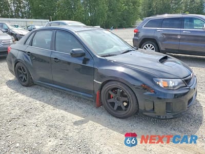 Czwarte zdjęcie samochodu z boku: 2011 SUBARU IMPREZA WRX VIN:JF1GV7E64BG516125 - miniatura