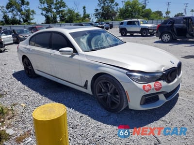 Czwarte zdjęcie samochodu z boku: 2018 BMW 740 I VIN:WBA7E2C53JG741932 - miniatura