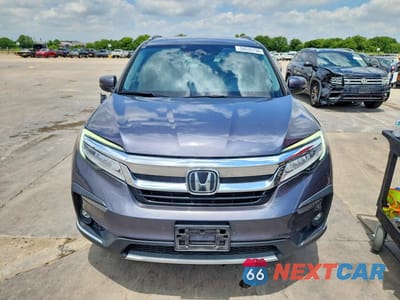 Piąte zdjęcie samochodu w środku: 2021 HONDA PILOT TOURING VIN:5FNYF5H92MB039164 - miniatura