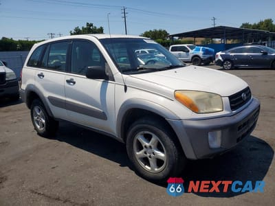 Czwarte zdjęcie samochodu z boku: 2002 TOYOTA RAV4 BASE VIN:JTEHH20V026061220 - miniatura