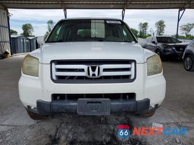 Piąte zdjęcie samochodu w środku: 2007 HONDA PILOT EX VIN:5FNYF18427B017554 - miniatura