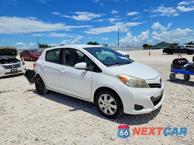 Czwarte zdjęcie samochodu z boku: 2012 TOYOTA YARIS 5-DOOR LE VIN:JTDKTUD39CD519329 - miniatura