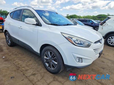 Czwarte zdjęcie samochodu z boku: 2015 HYUNDAI TUCSON SE VIN:KM8JUCAG6FU079290 - miniatura