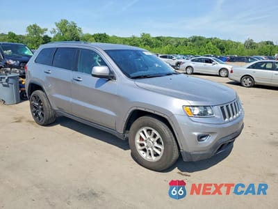 Czwarte zdjęcie samochodu z boku: 2015 JEEP GRAND CHEROKEE LAREDO VIN:1C4RJFAG5FC158232 - miniatura
