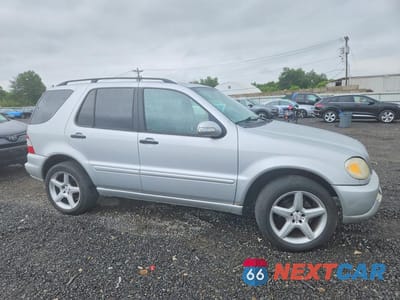 Czwarte zdjęcie samochodu z boku: 2003 MERCEDES-BENZ ML 350 VIN:4JGAB57E13A415383 - miniatura