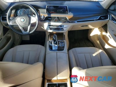 Zdjęcie 8 z 12 samochodu: 2016 BMW 740 I VIN:WBA7E2C57GGD99896 - miniatura