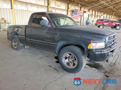 Czwarte zdjęcie samochodu z boku: 2000 DODGE RAM 1500 VIN:1B7HC16Y5YS581024 - miniatura