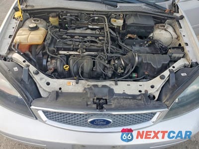 Zdjęcie 11 z 12 samochodu: 2005 FORD FOCUS ZX4 VIN:1FAFP34N05W220410 - miniatura