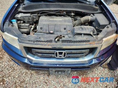 Zdjęcie 11 z 12 samochodu: 2011 HONDA RIDGELINE RT VIN:5FPYK1F21BB005036 - miniatura