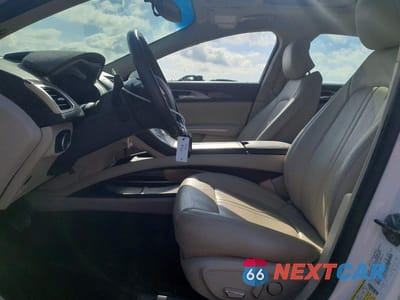 Zdjęcie 7 z 12 samochodu: 2016 LINCOLN MKZ VIN:3LN6L2J96GR615572 - miniatura