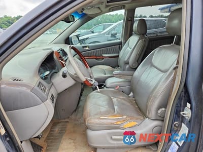 Zdjęcie 7 z 13 samochodu: 2004 TOYOTA SIENNA XLE LIMITED 7 PASSENGER VIN:5TDBA22CX4S008795 - miniatura