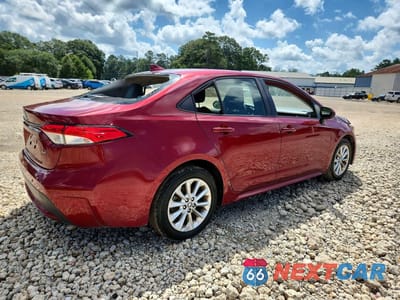 Trzecie zdjęcie samochodu z tyłu: 2022 TOYOTA COROLLA LE VIN:JTDVPMAE2NJ208370 - miniatura