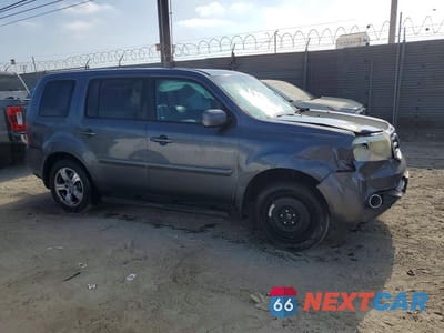 Czwarte zdjęcie samochodu z boku: 2014 HONDA PILOT EXL VIN:5FNYF3H55EB026301 - miniatura