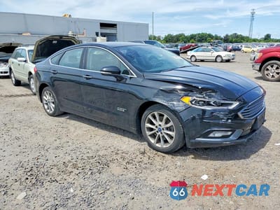 Czwarte zdjęcie samochodu z boku: 2017 FORD FUSION SE PHEV VIN:3FA6P0PU7HR332095 - miniatura