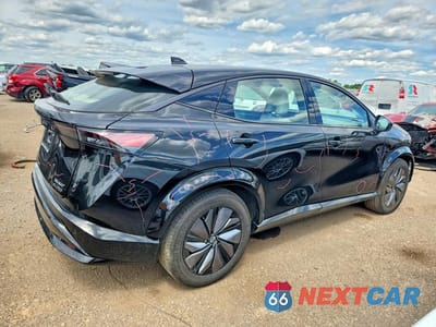 Trzecie zdjęcie samochodu z tyłu: 2024 NISSAN ARIYA ENGAGE+ E-4ORCE VIN:JN1DF0BB3RM730928 - miniatura