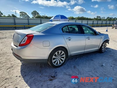 Trzecie zdjęcie samochodu z tyłu: 2013 LINCOLN MKS VIN:1LNHL9DK4DG613130 - miniatura