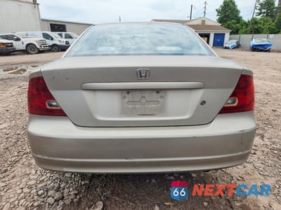 Zdjęcie 6 z 12 samochodu: 2002 HONDA CIVIC LX VIN:1HGEM22512L003250 - miniatura