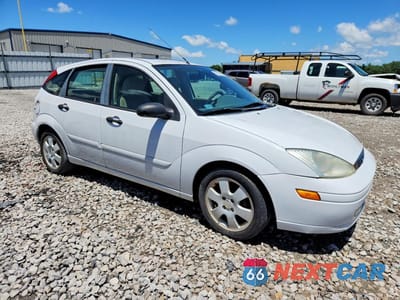 Czwarte zdjęcie samochodu z boku: 2002 FORD FOCUS ZX5 VIN:3FAFP37342R166022 - miniatura