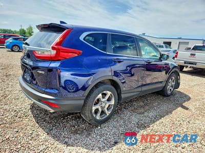 Trzecie zdjęcie samochodu z tyłu: 2018 HONDA CR-V EXL VIN:7FARW2H80JE023328 - miniatura