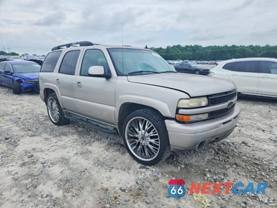Czwarte zdjęcie samochodu z boku: 2006 CHEVROLET TAHOE C1500 VIN:1GNEC13T36R121948 - miniatura