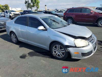 Czwarte zdjęcie samochodu z boku: 2007 VOLKSWAGEN JETTA WOLFSBURG VIN:3VWEF81K67M168507 - miniatura