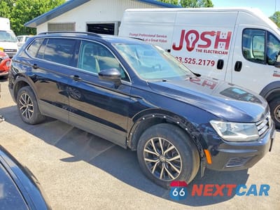 Czwarte zdjęcie samochodu z boku: 2019 VOLKSWAGEN TIGUAN SE VIN:3VV2B7AX8KM056356 - miniatura
