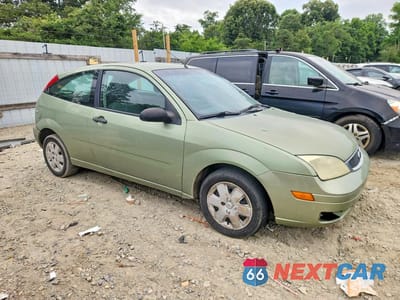 Czwarte zdjęcie samochodu z boku: 2007 FORD FOCUS ZX3 VIN:1FAFP31NX7W338763 - miniatura