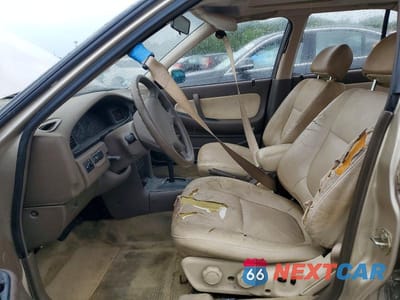 Zdjęcie 7 z 12 samochodu: 1992 NISSAN MAXIMA GXE VIN:JN1HJ01P7NT605525 - miniatura