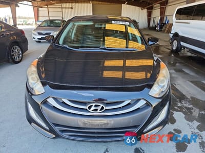 Piąte zdjęcie samochodu w środku: 2014 HYUNDAI ELANTRA GT BASE VIN:KMHD35LH5EU160636 - miniatura