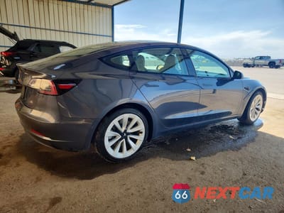 Trzecie zdjęcie samochodu z tyłu: 2022 TESLA MODEL 3 VIN:5YJ3E1EA0NF370024 - miniatura