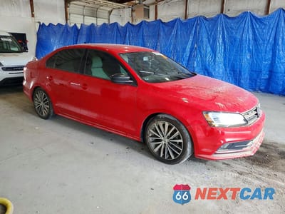 Czwarte zdjęcie samochodu z boku: 2017 VOLKSWAGEN JETTA SPORT VIN:3VWD17AJ1HM391096 - miniatura