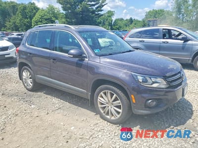 Czwarte zdjęcie samochodu z boku: 2016 VOLKSWAGEN TIGUAN S VIN:WVGBV7AX2GW521755 - miniatura