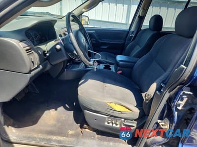 Zdjęcie 7 z 13 samochodu: 2002 JEEP GRAND CHEROKEE LAREDO VIN:1J4GW48S32C286691 - miniatura