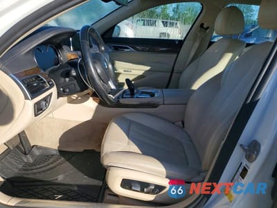 Zdjęcie 7 z 12 samochodu: 2016 BMW 740 I VIN:WBA7E2C57GGD99896 - miniatura