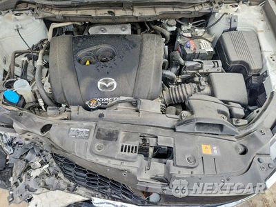 Zdjęcie 12 z 13 samochodu: 2014 MAZDA CX-5 TOURING VIN:JM3KE2CY4E0310996 - miniatura