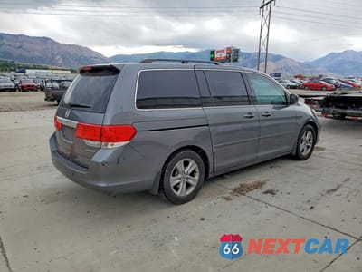 Trzecie zdjęcie samochodu z tyłu: 2010 HONDA ODYSSEY TOURING VIN:5FNRL3H95AB018905 - miniatura