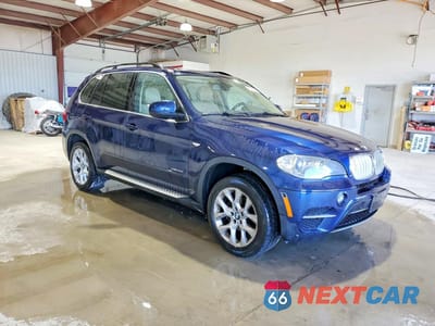 Czwarte zdjęcie samochodu z boku: 2013 BMW X5 XDRIVE35I VIN:5UXZV4C56D0B14700 - miniatura